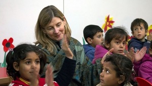 Image: Ai Weiwei artworks will bring attention to the plight of these Syrian children at Islahiye Refugee Camp in Turkey playing with USAID Assistant Administrator for Democracy, Conflict, and Humanitarian Assistance Nancy Lindborg 