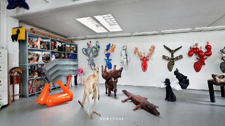 Image: Roland Faesser's website homepage allows a 3-dimentional view of his studio, making it one of our top ten artist websites