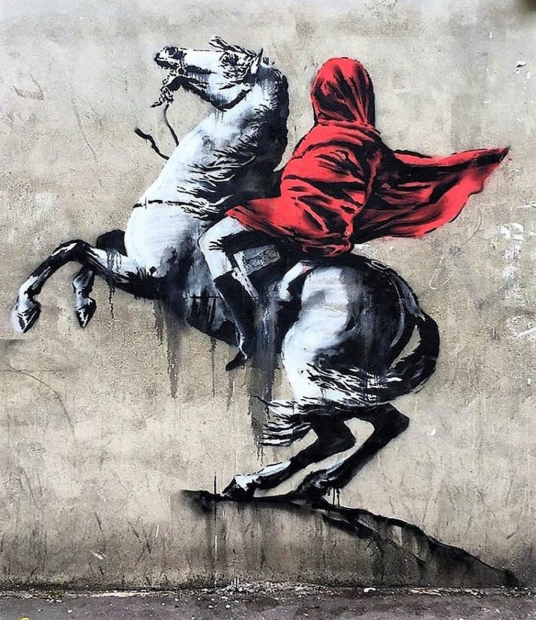 Image: In one of the new Banksy works addressing the pain of migrants in Paris the artist uses explores Napoleon wearing niqab worn by some Muslim women