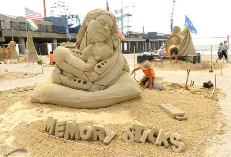 Image- Memory Sticks by Mélineige Beauregard and Jonathan Bouchard of Canada won the first place doubles competition at the World Championship of Sand Sculpting in Atlantic City. A great art contest/ art competition