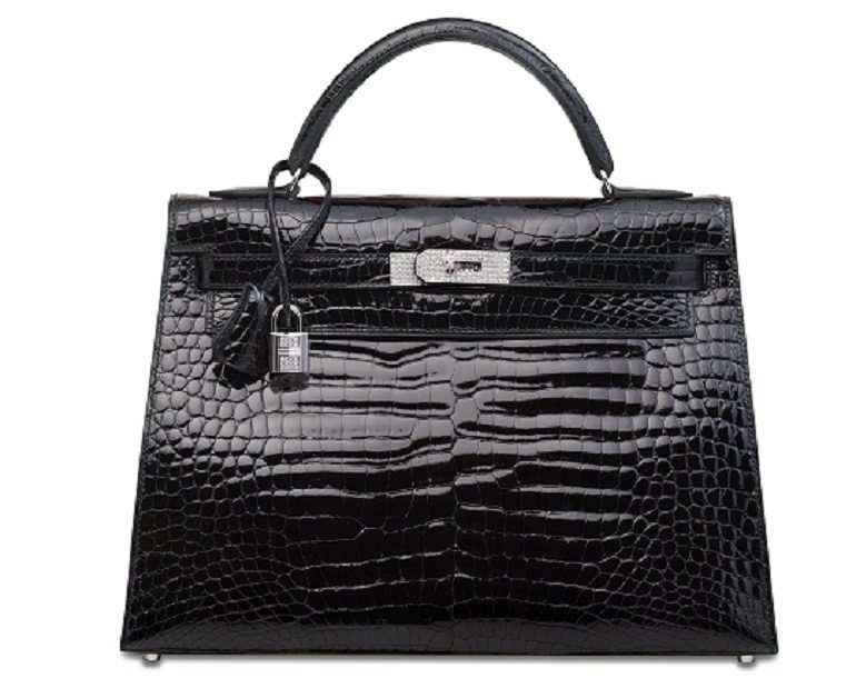 Image: An Exceptional Shiny Black Porosus Crocodile Diamond Sellier Kelly 32 With 18k White Gold & Diamond Hardware, Hermès, 2008, at Christie's Handbags and Accessories auction in Hong Kong