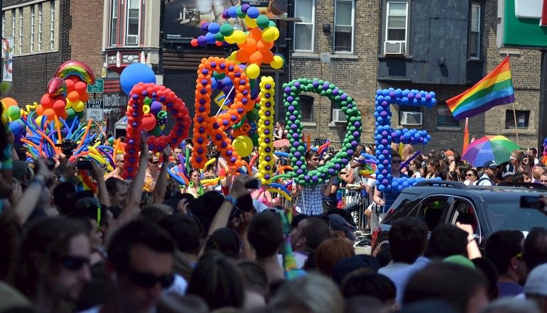 Image: People having fun during a Pride Parade. The Pride Balloons are expected to be part of Baltimore Pride Parade. Entertainment News