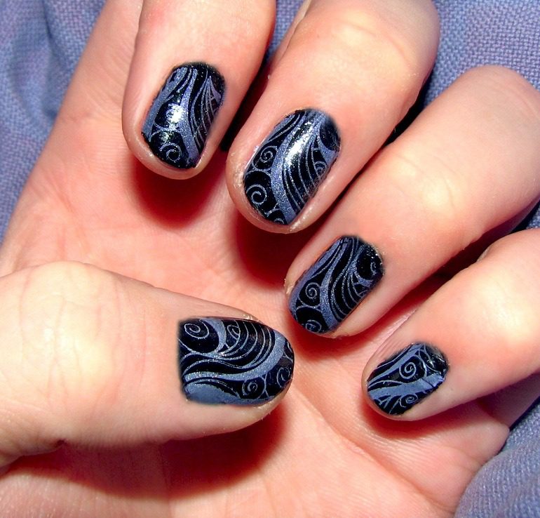 Image: Swirly purple konad nail art by Courtney Rhodes show one of the nail art designs by nail art artists