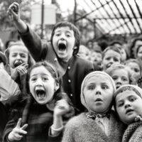 Image: Alfred Eisenstaedt's Children at a Puppet Theatre, Paris, 1963, captures childhood excitements and innocence