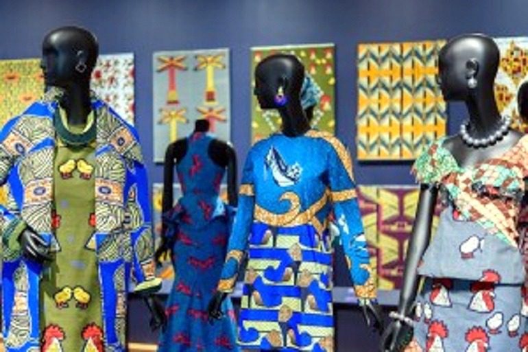 Image: Beautiful dresses made from wax printed fabrics with bold patterns Image: Three beautiful women show off their dresses made from with wax printed fabrics with bold patterns that have been described as Authentic African Fabric by Vlisco at the Philadelphia Museum of Art is part of African identity