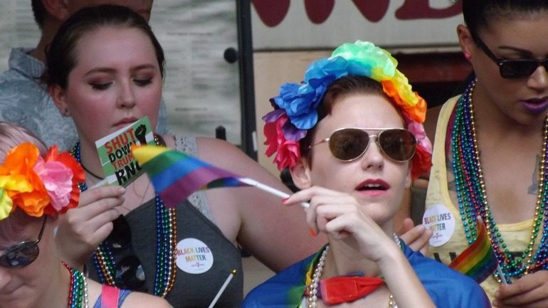 Image: Politics was also on display at the Baltimore Pride Parade where members of LGBTQ community distributed political flyers 