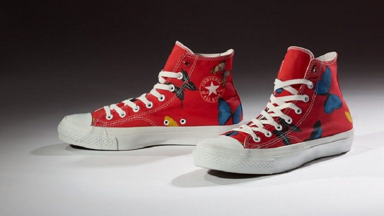 Image: Converse, Damien Hirst (Product) RED is a pair of sneakers with butterflies, a motive extensively used by the artist in paintings. 