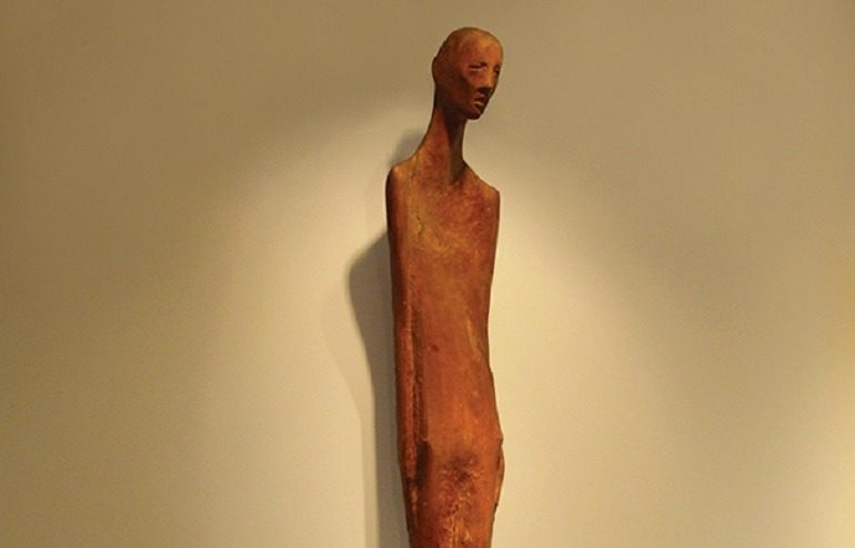 Image: Recovery, an Applewood figure sculpture by an Anonymous artist is in the collection of the American Visionary Art Museum