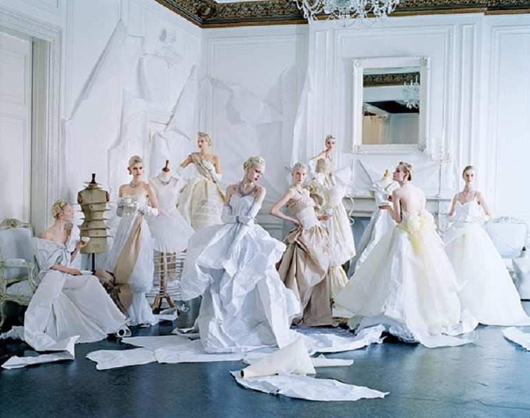 Image: Tim Walker photograph of several models dressed in paper dresses and jewelry created by Rhea Thierstein. One of the famous fashion photographers that worked with Grace Coddington at Vogue 