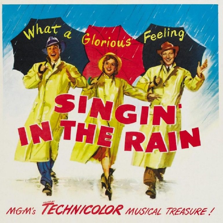 Image: This Singin in the Rain poster shows Gene Kelly, Donald O'Connor, and Debbie Reynolds as they performed in this all time classic