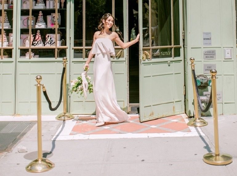 Image: Cara Santana unveiling the ‘Cara’ dress from the Monique Lhuillier Bridesmaids collection for Vow To Be Chic; Danielle Bernstein and Cara Santana