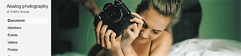 Image: Portrait of a beautiful woman with a DSL camera on the banner of the Analog photography Group, one of the Facebook Photography Groups that provide Photography tutorials and photography tips for aspiring and amateur photographers