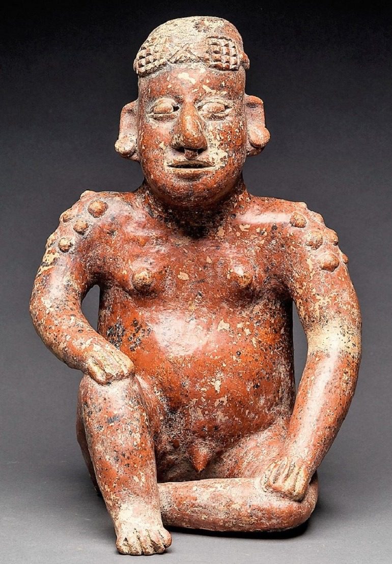 Image: El Arenal Brown Style Jalisco Terracotta Sculpture of a Seated Man dating back to 300 BC to 300 AD is one of the important works in Beauty in the Ancient Americas Pre-Columbian-Aesthetics at Barakat Gallery