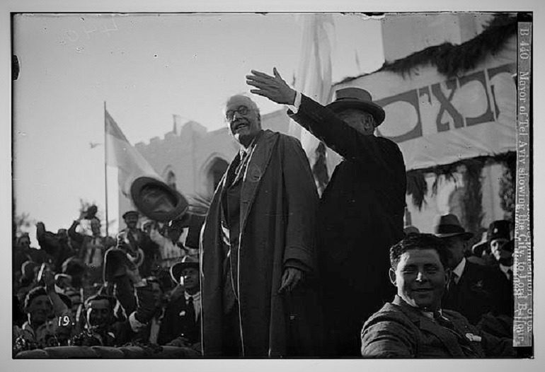 Image: Black and white photograph of the Mayor of Tel Aviv showing the city to Lord Balfour, an issue that was addressed by New Banksy work unveiled in Bethlehem 