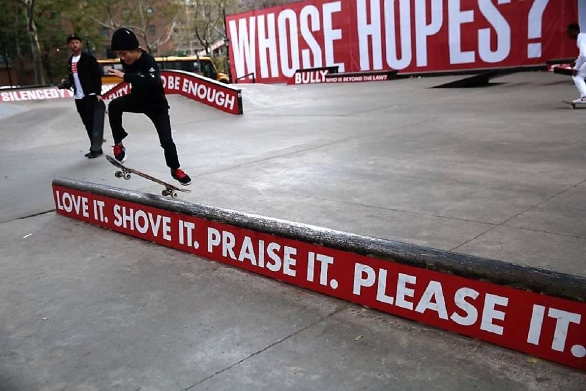 Image: At Barbara Kruger Performa 17 Commission at the installation at Coleman Skatepark in New York City, a skateboarder rides one of the signs on display