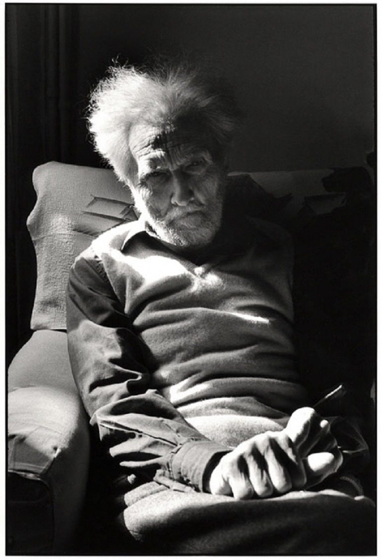 Image: This black and white portrait photograph of Ezra Pound sitting in a chair by Henri Cartier-Bresson shows how the famous photographer used light to accentuate the character of his subject