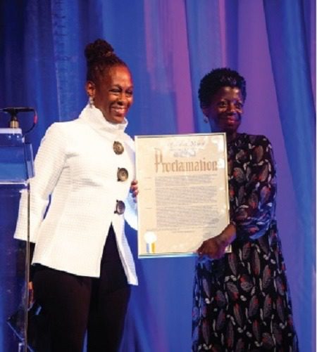 Image: Thelma Golden, Director and Chief Curator of The Studio Museum receiving the Mayoral Proclamation to commemorate the Museum’s historic fifty-year legacy from the First Lady New York City Chirlane McCray