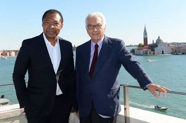 Image: Coco Fusco was one of the artists in the 56th La Biennale di Venezia organized by Okwui Enwezor seen here with Paolo Baratta, President of La Biennale di Venezia 