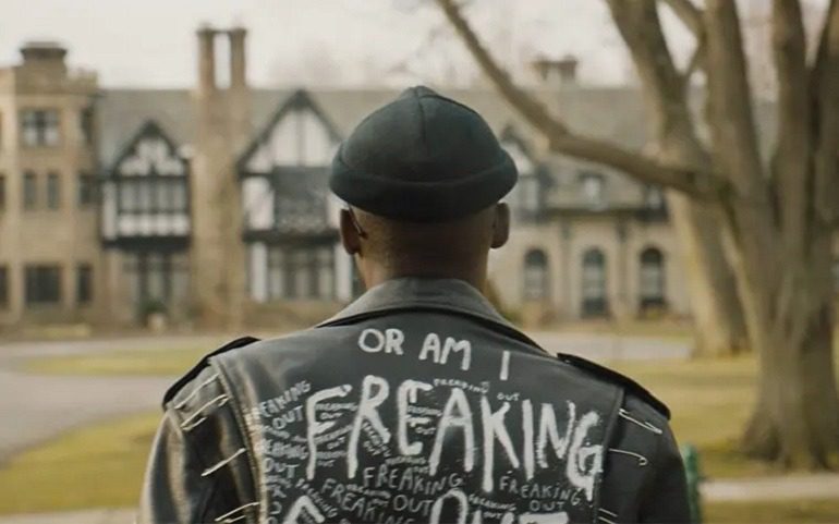 Image: Portrait of Bigger Thomas looking at the opulence building in Native Son, a movie by  Rashid Johnson, one of the films in the Art Basel film program