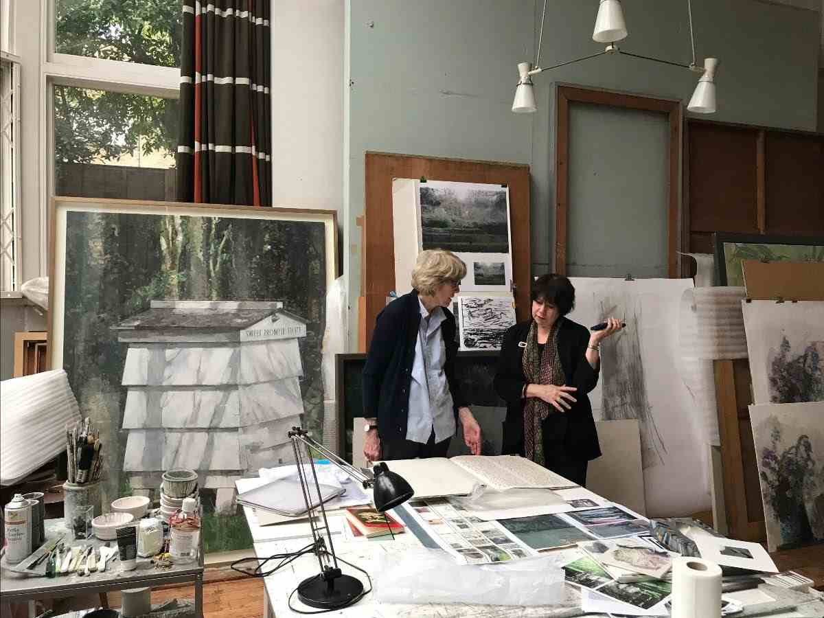 Retirement wishes for Elisabeth Fairman seen this photograph having a conversation with Eileen Hogan in her London studio