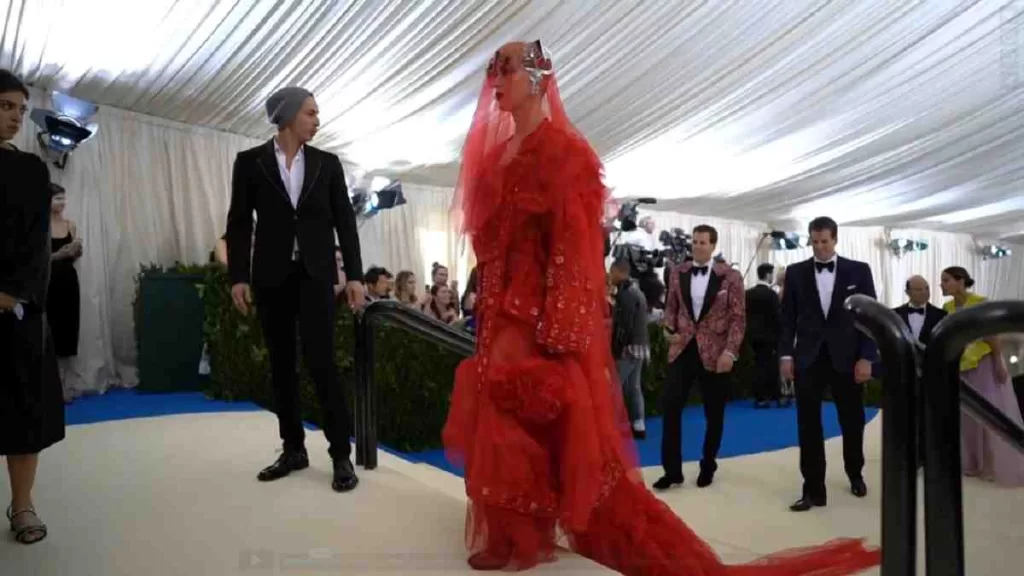 American singer Katy Perry at the 2017 Met Gala shows social etiquette for Art Exhibition Openings and Art Galas