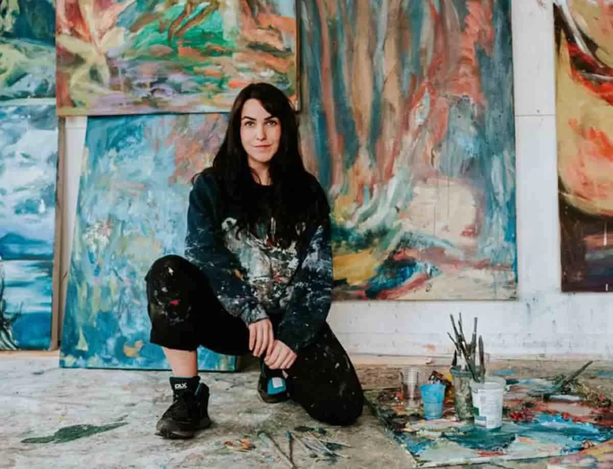 British Abstract Artist Sarah Cunningham in her studio with some of her paintings.
