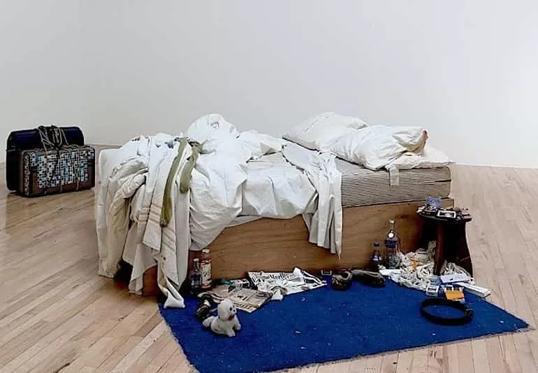 In exploring the beauty of love in art, Tracey Emin uses her  bed,  box frame, mattress, linens, pillows, and various objects. 