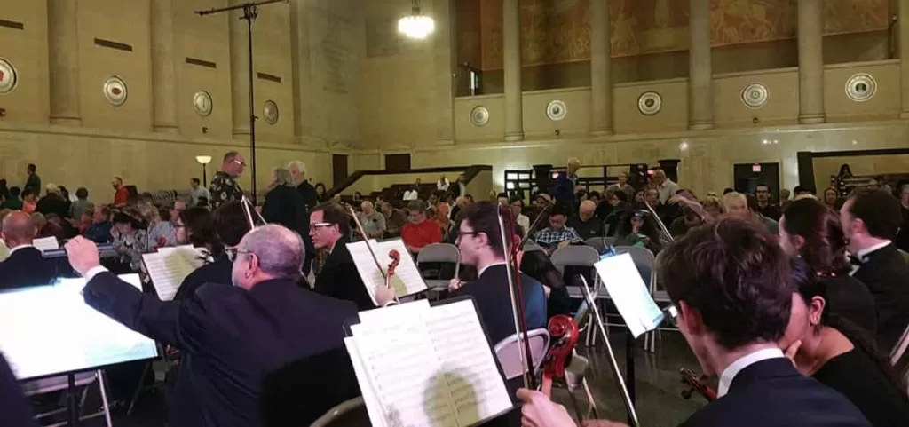 A concert in the spacious auditorium at the Baltimore War Memorial Building under the War Memorial Art Initiative program.