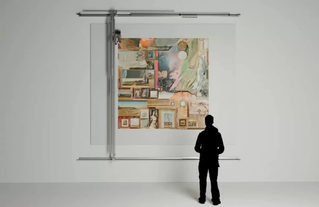 A figure stands in front of Untitled Robot Painting by Alexander Reben. The colorful abstract includes shapes and images. This Artificial Intelligence Art will feature prominently in Christie's AI art auction