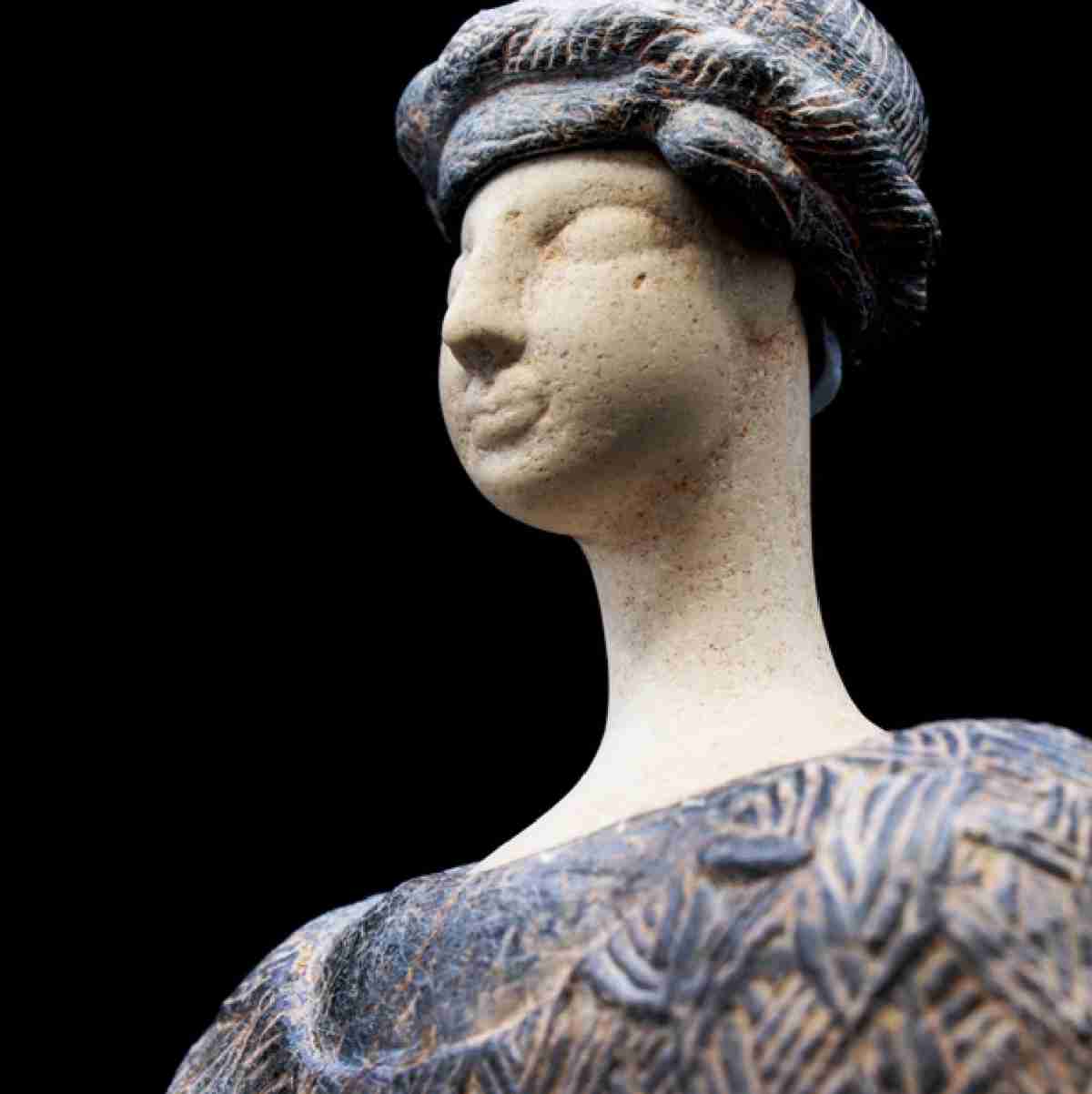 Bactrian Princess — a serene Third Millennium BC composite idol adorned in blue headgear and a matching blue dress, both detailed with intricate line motifs.